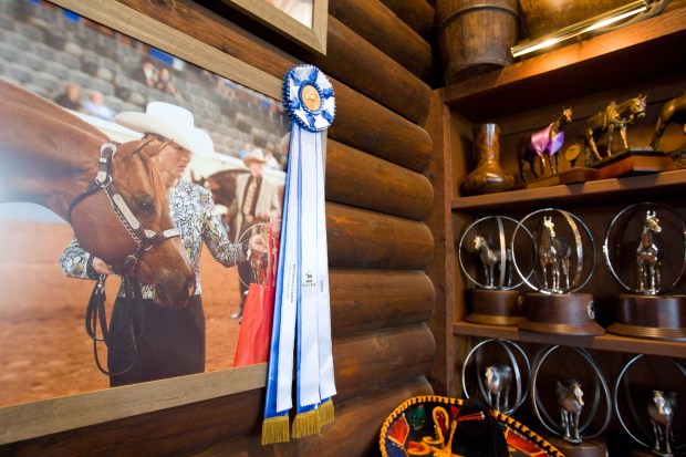 A picture of Rita Crundwell hangs among hundreds of awards on display at the former comptroller's horse ranch in Dixon on Aug. 3, 2012. (Alex Garcia/Chicago Tribune)