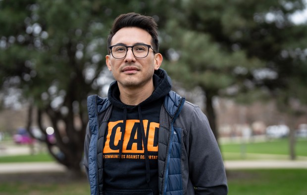 A protestor at UIC University Hall lawn during the Day of Action for High Ed on April 16, 2025. (E. Jason Wambsgans/Chicago Tribune)