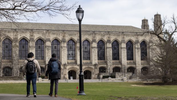 People walk by Deering Meadow on the Northwestern University campus on March 31, 2025, in Evanston. (Brian Cassella/Chicago Tribune)
