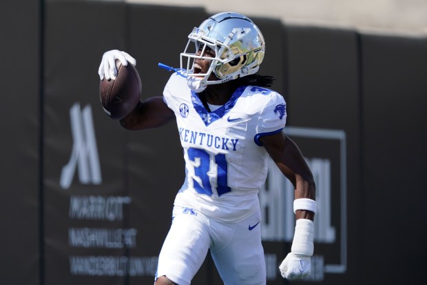 Kentucky cornerback Maxwell Hairston celebrates his interception return for a touchdown against Vanderbilt on Sept. 23, 2023, in Nashville, Tenn. (AP photo/George Walker)