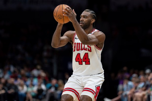 Chicago Bulls forward Patrick Williams (44) shoots the ball against the Charlotte Hornets during the first half of an NBA game Sunday, April 6, 2025, in Charlotte, N.C. (AP Photo/Jacob Kupferman)
