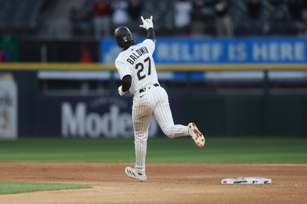 White Sox left fielder Brooks Baldwin celebrates while rounding second base after hitting a home run during the third inning against the Athletics on April 16, 2025, at Rate Field. (Geoff Stellfox/Getty Images)