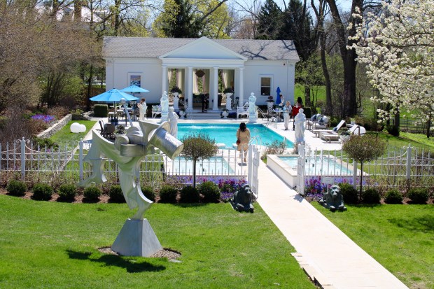 Overlooking the pool house and pool designed by David Adler all part of the Lake Forest Showhouse & Gardens, which opened Saturday, April 26, 2025, at Pembroke Lodge, offering a sublime showcase of the transformation of almost 50 interior and exterior spaces, each with its own designer, in a salute to pure artistic vision. (Gina Grillo/ for the Pioneer Press)
