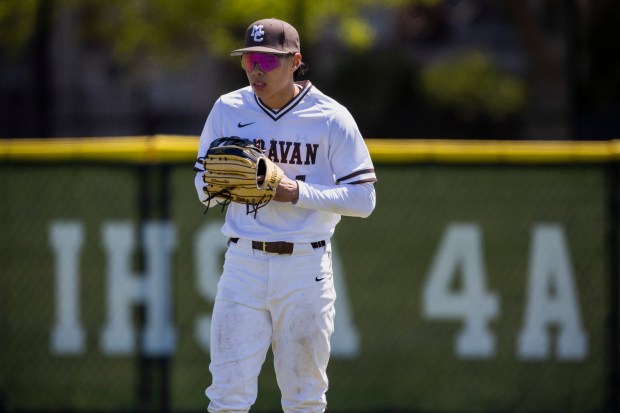 Mount Carmel's Logan Fernandez (1) waits in right field between batters from Homewood-Flossmoor during a nonconference game in Chicago on Saturday, April 26, 2025. (Vincent D. Johnson / for the Daily Southtown)