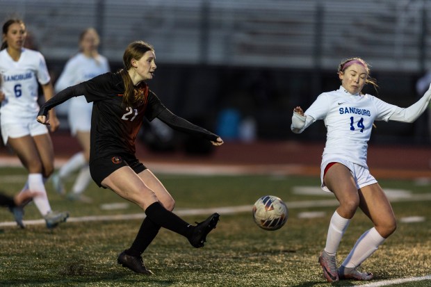 Lincoln-Way West's Katelyn Mrozowksi (21) scores a goal against Sandburg during a Southwest Suburban Conference game in New Lenox on Thursday, April 10, 2025. (Vincent D. Johnson / for the Daily Southtown)