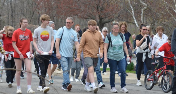 Hundreds of people turned out April 18, 2025, to take part in the New Lenox Ministerial Association Good Friday Cross Walk. (Jeff Vorva/for the Daily Southtown)