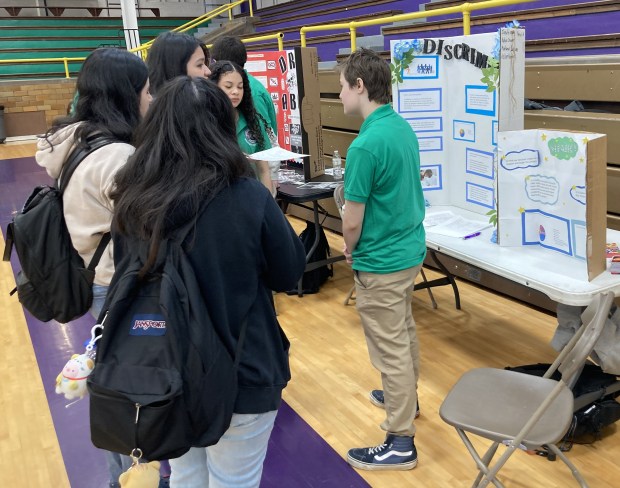Students talk about a Mikva Challenge discrimination project. (Steve Sadin/For the Lake County News-Sun)
