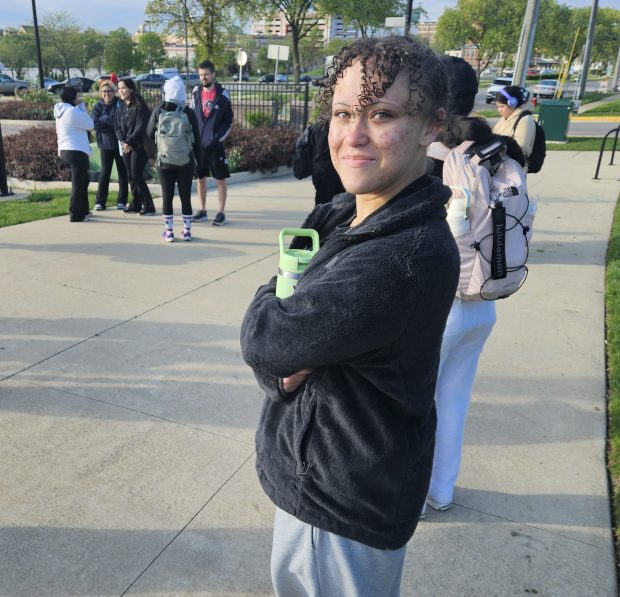 Sinclair Zackery, 17, of Aurora participated in a walk from Aurora to Elgin on Saturday connected to the Survivor Literature class at East Aurora High School. (David Sharos / For The Beacon-News)