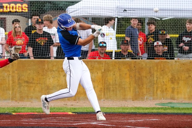 St. Charles North's Matthew Kelly cracks a double against Batavia during a Class 4A Batavia Regional semifinal game at Batavia High School on Thursday, May 29, 2025. (Sean King / for The Beacon-News)