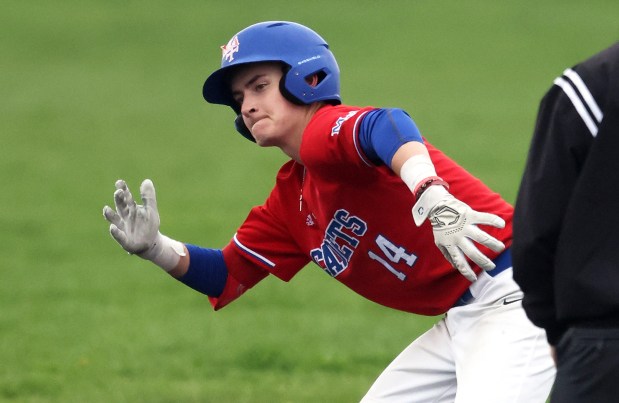 Marmion's Charlie Zebig (14)reacts to his third double against Fenwick in the seventh inning during a Chicago Catholic Conference game in Aurora on Thursday, May 1, 2025.(H. Rick Bamman / The Beacon-News)