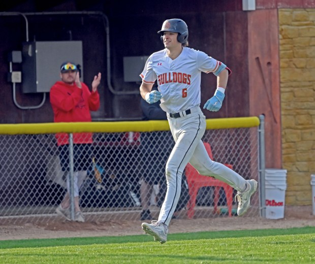 Batavia's Luke Stevenson trots home after hitting a three-run homer. Batavia baseball defeated Geneva 6-1, Friday, May 2, 2025, in Batavia, Illinois. (Jon Langham/for the Beacon-News)