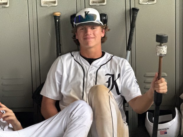 Kaneland's Brady Alstott waits with his team in the Kaneland press box during a lightning delay in a non-conference game against Sandwich at Kaneland High School in Maple Park on Friday, May 16, 2025. (Sean King / for The Beacon-News)