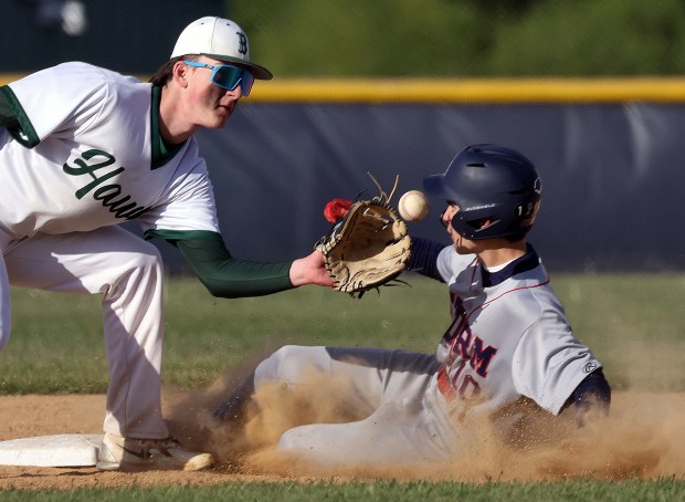 South Elgin's Lucas Seifrid (10) is safe at second as Bartlett's Brandon Pelz (3) waits for the throw in the sixth inning during an Upstate Eight Conference game in Bartlett on Monday, May 19, 2025(H. Rick Bamman/The Beacon-News)