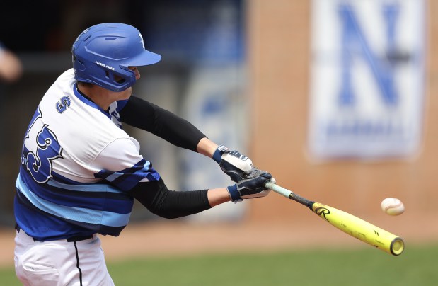 St. Charles North's Matt Ritchie (13)connects in the seventh inning against St. Charles East during a DuKane Conference game in St. Charles on Saturday, May 3, 2025.(H. Rick Bamman/for the Beacon-News)