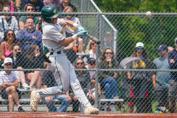 Waubonsie Valley's Ryan Lucas (7) slaps a double against West Aurora during a Waubonsie Valley Class 4A Regional Final Game at Waubonsie Valley High School in Aurora on Saturday, May 31, 2025. (Sean King / for The Beacon-News)