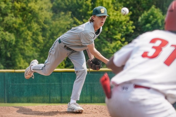 Waubonsie Valley's Nick Lambert (21) fires a pitch against West Aurora during a Waubonsie Valley Class 4A Regional Final Game at Waubonsie Valley High School in Aurora on Saturday, May 31, 2025. (Sean King / for The Beacon-News)