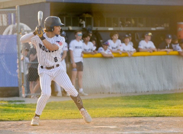 Oswego East's Niko Villacci (8) bats during the extra inning win against Yorkville at home on Tuesday, May 13, 2025. (Mark Black / for the Beacon-News)