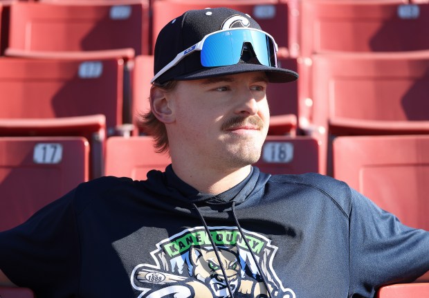 Kane County Cougars' Westin Muir sits in the stands after practice at Northwestern Medicine Field on May 8, 2025 in Geneva. Muir attended St. Charles North High School. (H. Rick Bamman / The Beacon-News)
