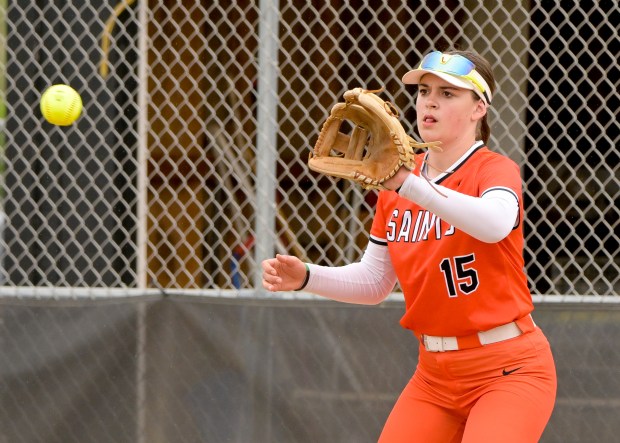 St. Charles East first baseman Caleigh Higgins (15) makes the play at 1st for the out against Geneva at home on Wednesday, April 30, 2025. (Mark Black / for the Beacon-News)