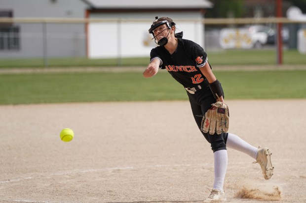 Sandwich's Brooklyn Marks (12) delivers a pitch against Newark during a nonconference game at Sandwich High School on Saturday, May 17, 2025. (Sean King / for The Beacon-News)
