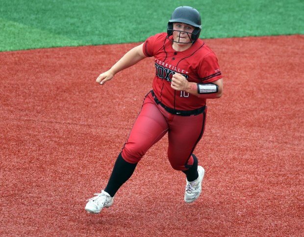 Yorkville's Kayla Kersting (10)rounds second after her fifth inning game winning RBI triple against Waubonsie Valley during the Class 4A Yorkville Regional semifinal in Yorkville on Tuesday, May 27, 2025.(H. Rick Bamman/for the Beacon-News)