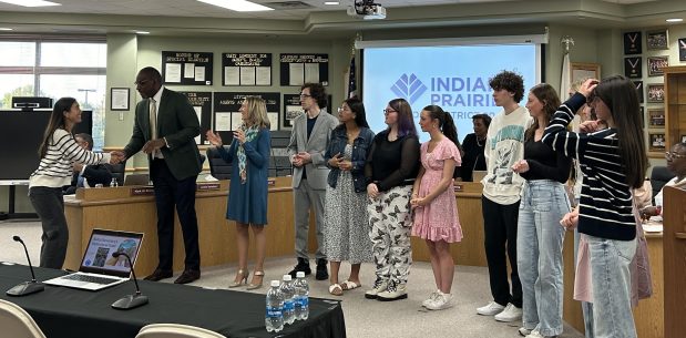 Students from Indian Prairie District 204's "Grow Your Own Teachers" program are recognized by the school board on May 5, 2025. (Molly Morrow / The Beacon-News)