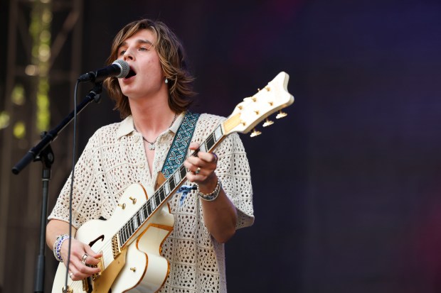 Axel Ellis of Ax and the Hatchetmen performs on the Bacardi stage at Lollapalooza in Chicago's Grant Park on Aug. 3, 2023. The band headlines the West Stage Saturday at Do Division Street. (Eileen T. Meslar/Chicago Tribune)