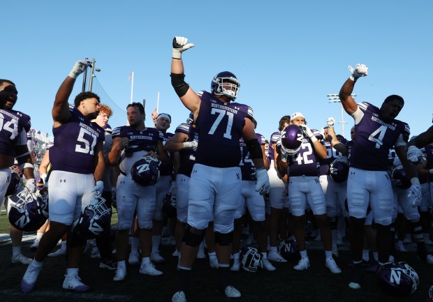Northwestern players celebrate after a 13-6 win over Miami (Ohio) on Aug. 31, 2024, at Martin Stadium in Evanston. (John J. Kim/Chicago Tribune)