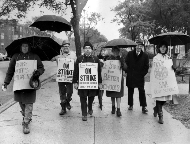 The Chicago Teachers Union went on strike today at over 600 Chicago schools as per CTU agreement, picket lines, like this one at Amundsen High School, were set up in the rain, May 22, 1969. (Chicago Tribune)