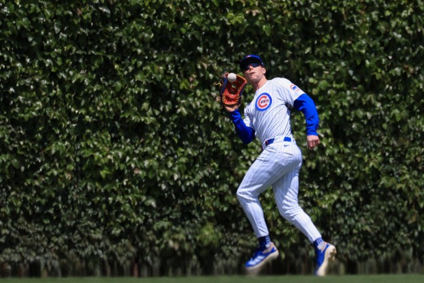 Cubs center fielder Pete Crow-Armstrong catches a fly ball by Reds second baseman Matt McLain in the third inning May 31, 2025, at Wrigley Field. (John J. Kim/Chicago Tribune)