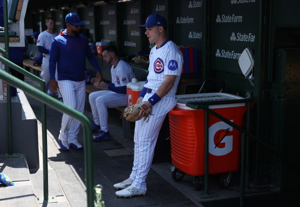 Cubs third baseman Matt Shaw, center, waits to take the field for a game against the Reds on May 31, 2025, at Wrigley Field. (John J. Kim/Chicago Tribune)