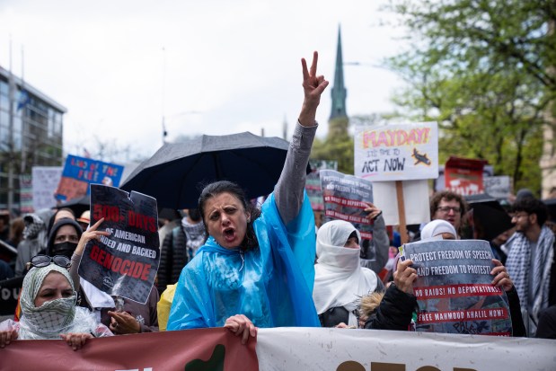Pro-Palestinian protesters rally through the West Loop during the May Day march, May 1, 2025. (E. Jason Wambsgans/Chicago Tribune)