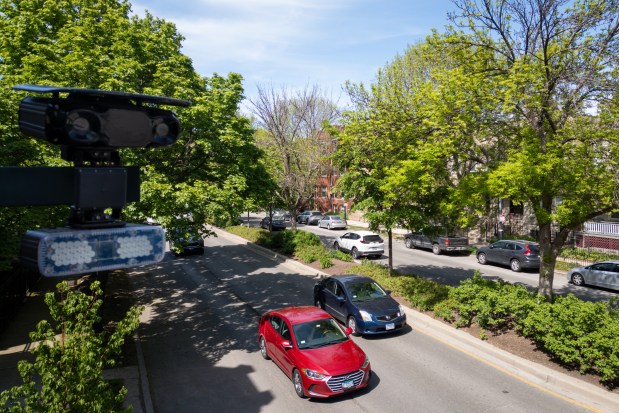 Cars pass a new speed camera on N. Ashland Ave. on May 13, 2025. (Audrey Richardson/Chicago Tribune)