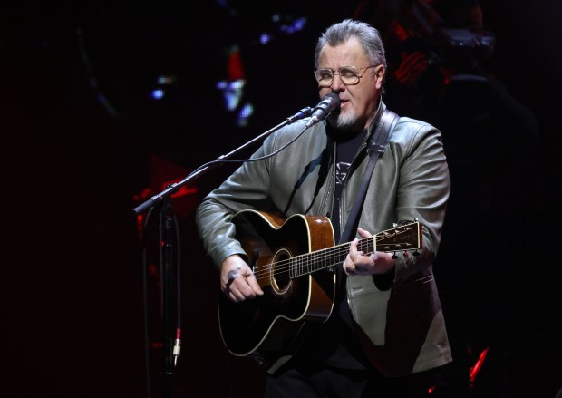 Vince Gill performs "Lyin' Eyes" with the Eagles at the United Center, March 8, 2024, in Chicago. (John J. Kim/Chicago Tribune)
