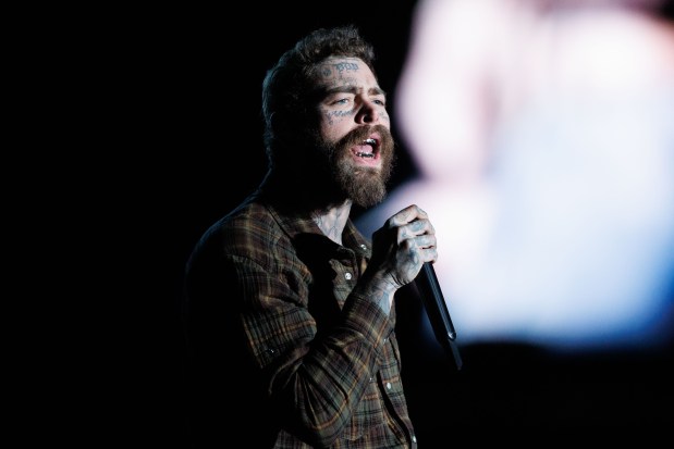 Post Malone performs at Wrigley Field on May 22, 2025, in Chicago. (Armando L. Sanchez/Chicago Tribune)