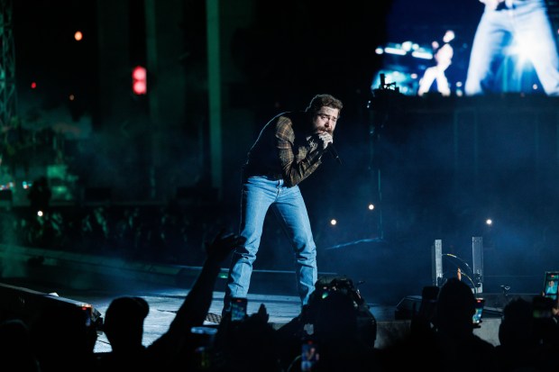 Post Malone performs at Wrigley Field on May 22, 2025, in Chicago. (Armando L. Sanchez/Chicago Tribune)