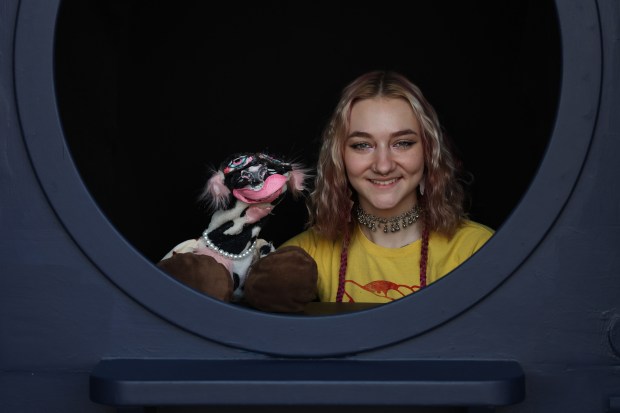 Sophia Tarducci holds a puppet named Moolissa at The Sugar Hole on Oct. 12, 2024. (John J. Kim/Chicago Tribune)
