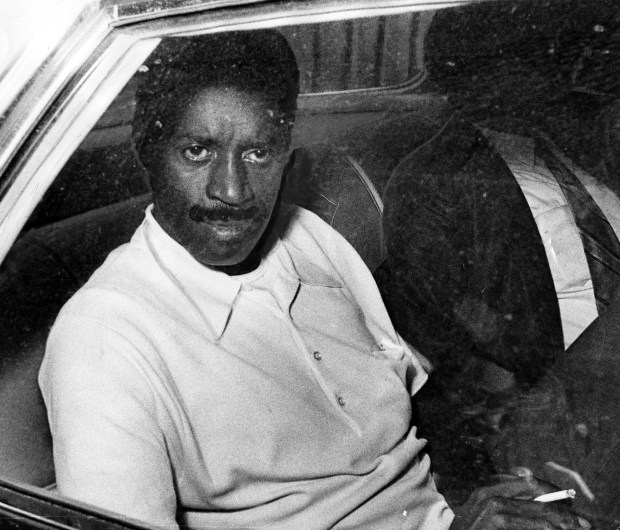 Former Chicago Ald. Fred Hubbard is driven to prison on Sept. 7, 1972. Hubbard pleaded guilty to embezzling nearly $100,000 from a federally funded jobs program he had headed. (Chicago Tribune archive)