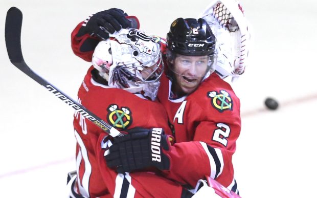 Blackhawks defenseman Duncan Keith, right, hugs goalie Corey Crawford after a win over the Predators in Game 6 of their Stanley Cup playoff series on April 25, 2015, at the United Center. Both players are on the modern-era ballot for the team's new Hall of Fame. (Nuccio DiNuzzo/Chicago Tribune)