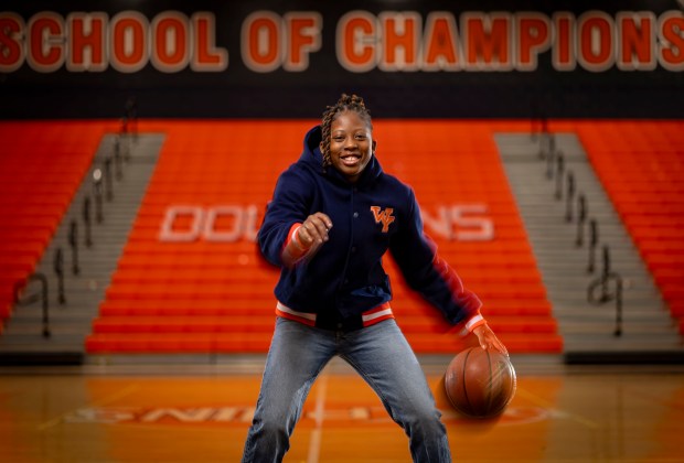 Destiny Jackson, a Whitney Young High School senior and Ms. Basketball of Illinois winner, in the school's gym on April 28, 2025. (Brian Cassella/Chicago Tribune)