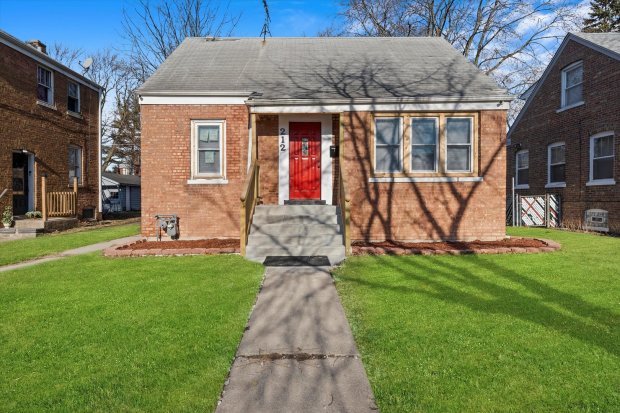 The owner of Pope Leo XIV's boyhood home first listed the house in January for $219,000. He cut his asking price to $205,000 later that month and then to $199,900 in February. (Richard Camacho/Prestige Real Estate Images)