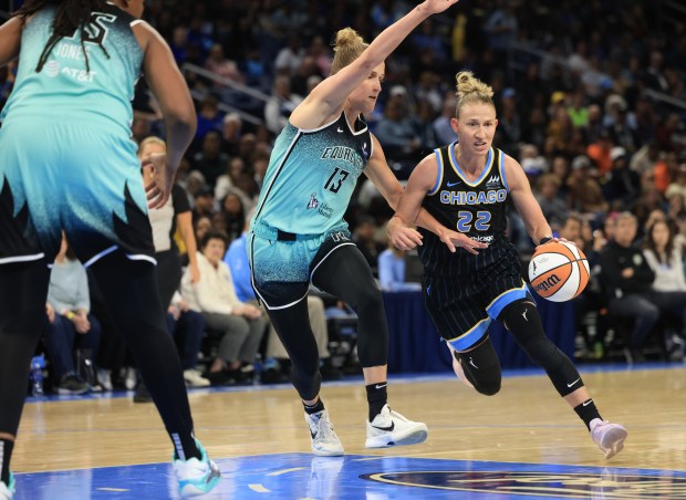 Sky guard Courtney Vandersloot (22) drives toward the basket as Liberty forward Leonie Fiebich (13) defends in the first quarter at Wintrust Arena on May 22, 2025, in Chicago. (John J. Kim/Chicago Tribune)