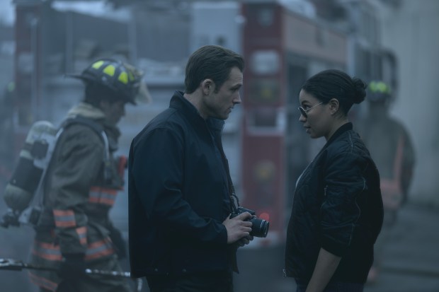From left: Taron Egerton and Jurnee Smollett in "Smoke." (Robert Falconer/Apple TV+)