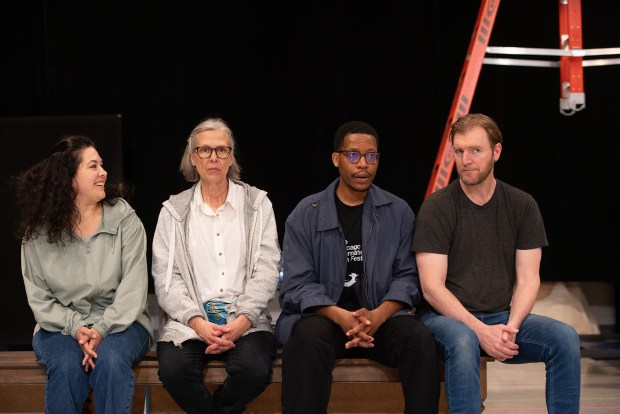 Sadieh Rifai with ensemble members Amy Morton, Namir Smallwood and Cliff Chamberlain in rehearsal for "You Will Get Sick" at Steppenwolf Theatre. (Joel Moorman)