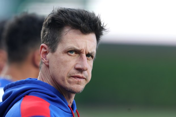 Cubs manager Craig Counsell stands for the national anthem before a game against the Marlins on May 14, 2025, at Wrigley Field. (Chris Sweda/Chicago Tribune)
