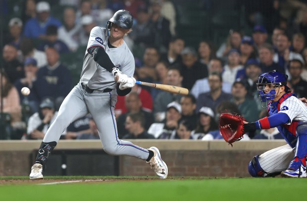 Miami Marlins center fielder Kyle Stowers triples in the ninth inning of a game against the Chicago Cubs at Wrigley Field in Chicago on May 14, 2025. (Chris Sweda/Chicago Tribune)