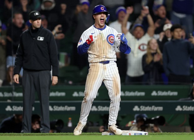 Chicago Cubs third baseman Matt Shaw starts to celebrate after his walk-off single in the 11th inning of a game against the Colorado Rockies at Wrigley Field in Chicago on May 27, 2025. (Chris Sweda/Chicago Tribune)