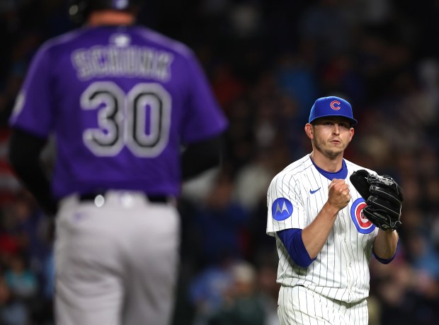 Chicago Cubs relief pitcher Chris Flexen pumps his fist after finishing off the Colorado Rockies during a scoreless 10th inning at Wrigley Field in Chicago on May 27, 2025. (Chris Sweda/Chicago Tribune)