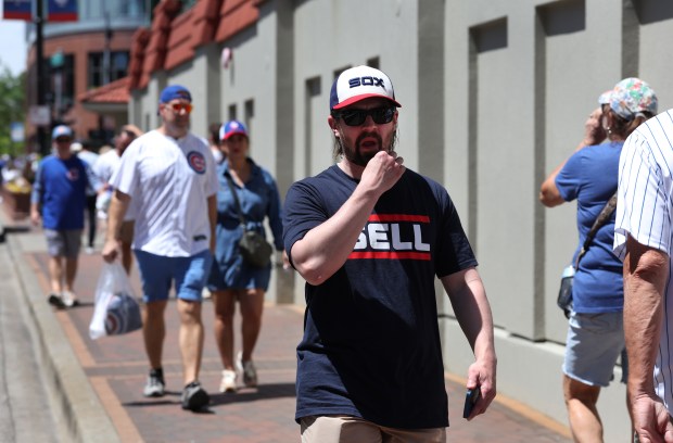 Chicago White Sox and Chicago Cubs fans arrive at Wrigley Field in Chicago for a game between the two teams on May 16, 2025. (Chris Sweda/Chicago Tribune)