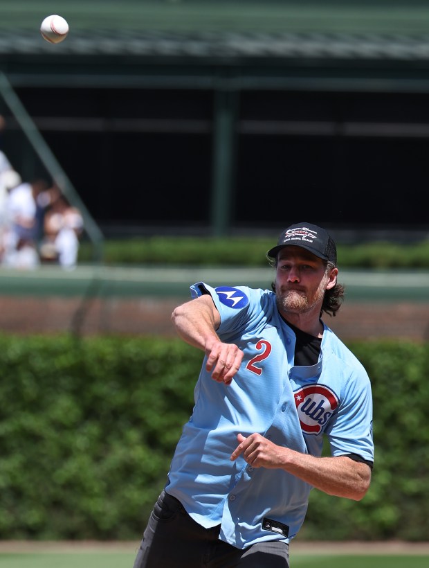Former Chicago Blackhawks player Duncan Keith throws out a ceremonial first pitch before the start of a game between the Chicago Cubs and the Chicago White Sox at Wrigley Field in Chicago on May 16, 2025. (Chris Sweda/Chicago Tribune)